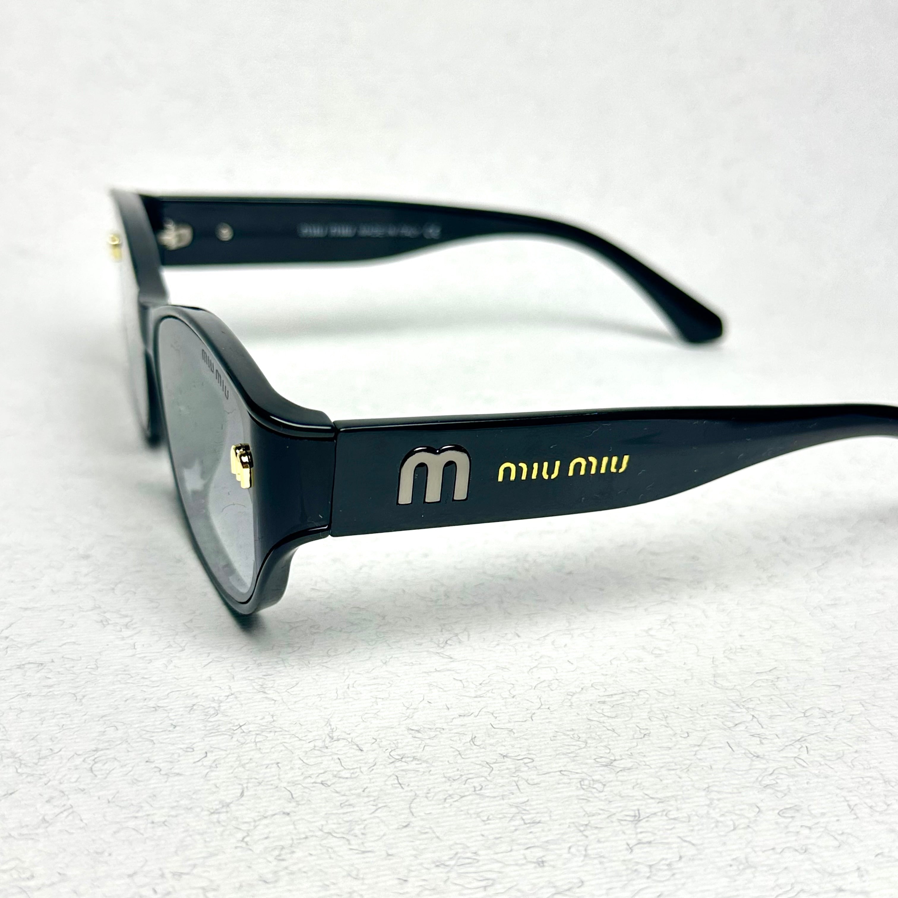 Miu Miu Black - Gold M22 2026