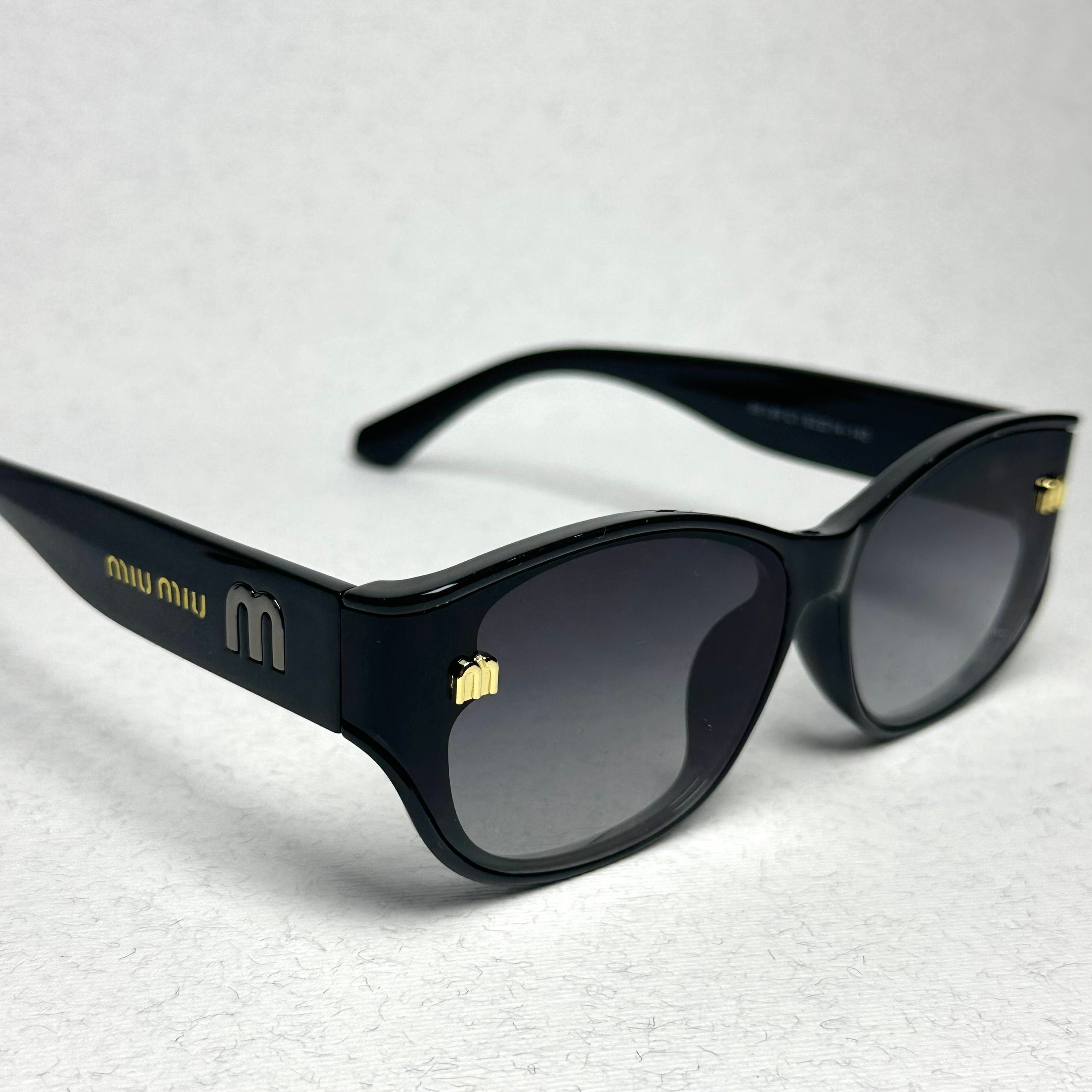 Miu Miu Black - Gold M22 2026